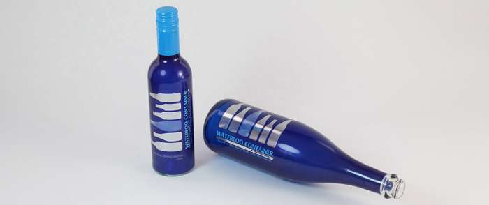 Waterloo Container Bottle Sleeve Samples Clear flint waterloo container glass bottles decorated with cobalt blue printed sleeves